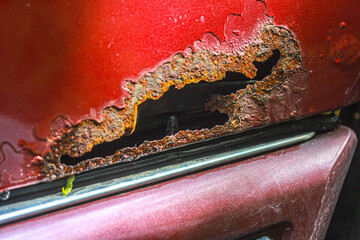 rusty element, progressive corrosion, damaged body, old car, paint shop, car workshop
