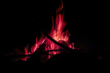 a bonfire burning at night, near the lake, vacation, travel, chillout
