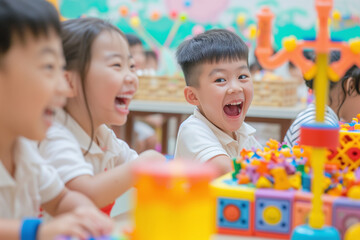 Obraz premium An asian boy screaming and playing with his friends in the classroom. concept of childhood.