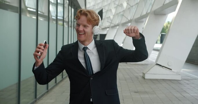Energetic dancing under influence of music man showcases essence of freedom His dance expression of freedom and joy captivates. Emotion-driven dance visual ode to freedom uplifted spirit.