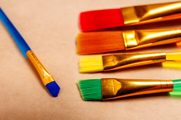Fototapeta premium Paint brushes. Background with selective focus and copy space