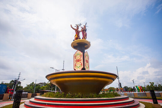 Mahir Mahar Monument, a monument honoring the local hero of Palangkaraya. The monument depicts a pair of traditional dancers with various ornaments typical of Central Kalimantan, Indonesia.