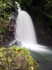 Tranquil scene of a waterfall with long exposure shot. Beauty of nature concept background.