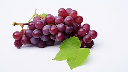bunch of red grapes with green leaf isolated on a white background