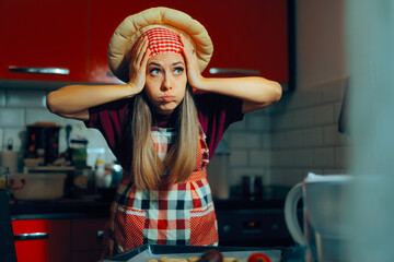 Stressed Home Cook Thinking What to Prepare for Dinner. Sad overworked woman struggling to plan a...