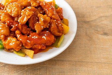fried crispy chicken with sweet and sour sauce