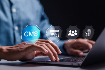 CMS, Content management system concept, Businessman use laptop with virtual screen of content management system icon for business website management.