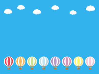 カラフルな気球が並んで飛んでいる空のベクターイラスト。旅行やレジャー、休暇のイメージの背景。真ん中はコピースペースで文字を入れることが可能。