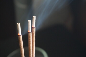 incense sticks in a row