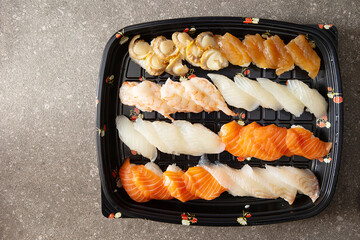 Different types of sushi on a plate	