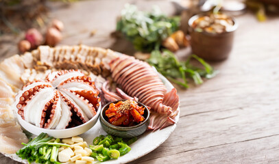 Boiled meat, vegetables and boiled octopus