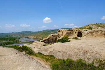 Uplistsikhe caves and Mtkvari River in Georgia