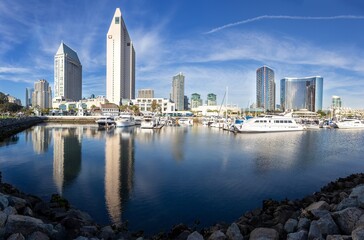 Scenic San Diego, California Marina Bay Panorama with City Center Highrise Buildings Skyline reflected in Calm Pacific Ocean Water