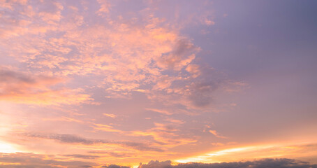 Panoramic view of sunset golden and blue sky nature background.
Colorful dramatic sky with cloud at sunset.Sky background.Sky with clouds at sunset.
