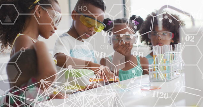 Image of elemental diagrams over happy diverse schoolchildren in chemistry class
