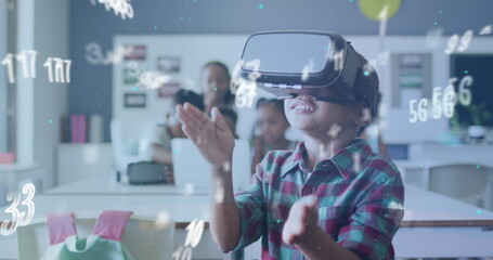 Image of data processing over happy biracial schoolboy using vr headset class