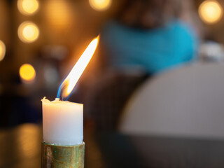 White candle burning
