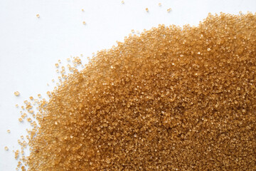 pile of cane brown sugar isolated on white background.