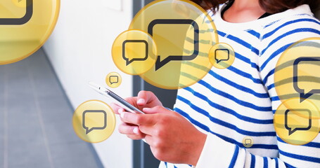 Image of digital icons over woman using smartphone