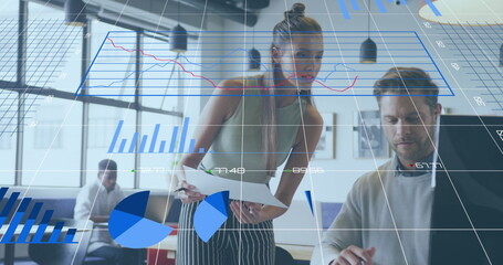 Image of data processing over diverse business people working at office