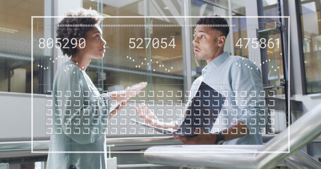 Image of data processing over diverse business people working at office