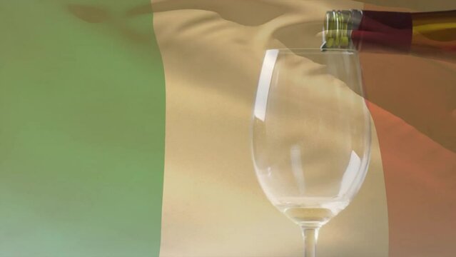 Composite of white wine being poured into glass over flag of italy background