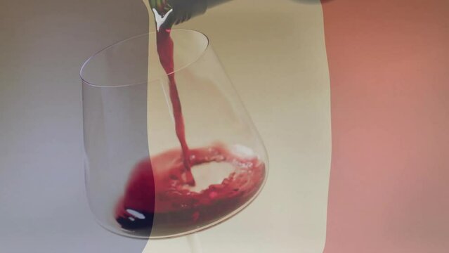 Composite of red wine being poured into glass over flag of france background