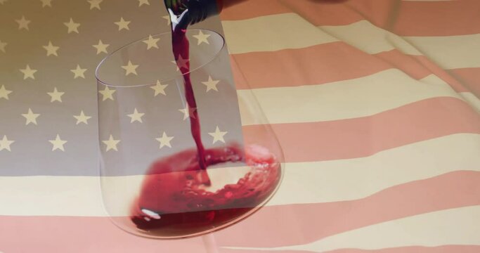 Composite of red wine being poured into glass over flag of usa background