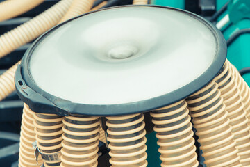 Plastic corrugated pipes in agricultural or industrial machinery. Detail and part of hydraulic or...