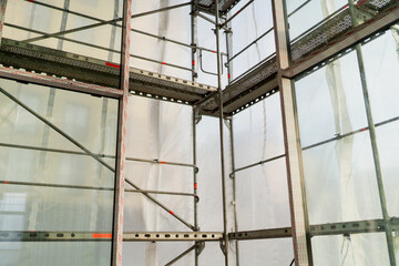 Scaffolding systems inside the building at construction site