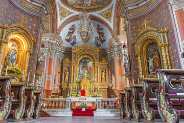 High altar of Parish Church of Saint Ulrich in Ortisei. South Tyrol, Italy - obrazy, fototapety, plakaty