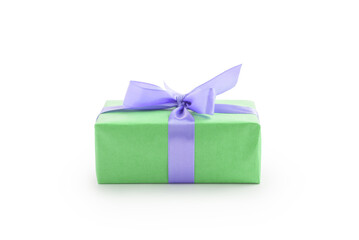 Fototapeta premium Green paper present box with violet ribbon bow isolated on white background