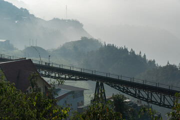 Fototapeta premium Fansipan Mountain Tramway, is a Tram railway for ride to Cable Car Station to Fansipan Peak in Sa Pa, Vietnam
