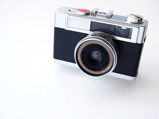 Vintage photo camera isolated on white and copy space 