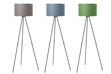 A three-legged floor lamp with a textile shade is isolated on a white background