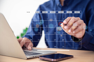 Calendar concept , Analyst working with computer in management system to make report with KPI and metrics connected to database. corporate strategy for finance, operations, sales, marketing .