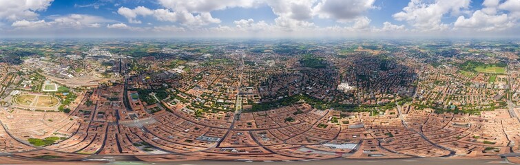 Modena, Italy. Historical Center. Panorama of the city on a summer day. Sunny weather with clouds. Panorama 360. Aerial view