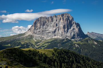 Sassolungo mountain seen from Dantercepies in Val Gardena on a sunny day, Dolomites, Trentino, Alto Adige, Italy