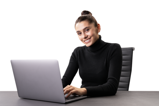 Cheerful young woman working on a laptop, casual business attire, office setting