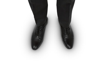 Top view of businessman's black shoes on white surface, corporate attire - obrazy, fototapety, plakaty
