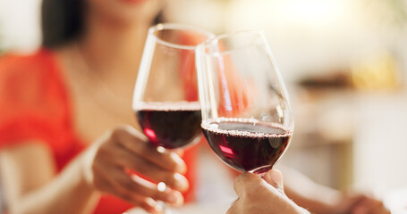 Couple, hands and toast with red wine for celebration of love, romance and valentines day on their...