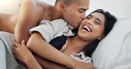 Happy couple, hug in bed and love with intimacy and romance at home for relationship, sex and bonding. Young people, woman and man relax in bedroom, cuddle and laughing with kiss and talking together - obrazy, fototapety, plakaty