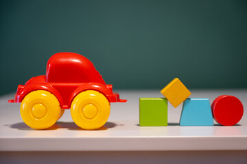 Fototapeta premium close up of toy car and some building blocks