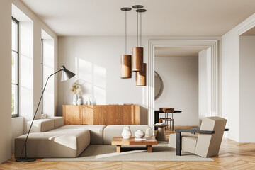 White living room interior with sofa and dresser