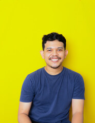 a potrait of asian young man smiling isolated, studio shoot. advertising concept.