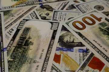 Fototapeta na wymiar Texture US dollars. Background of one hundred dollar bills.