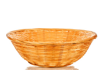 One straw bowl, macro, isolated on white background.
