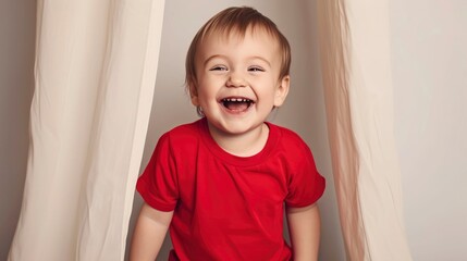 A toddler in a red t-shirt, laughing while playing peek-a-boo, t-shirt mockup