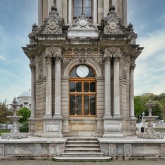 Fototapeta na wymiar Dolmabahce Clock Tower, Turkish: Dolmabahce Saat Kulesi, situated outside Dolmabahce Palace, Istanbul, Turkey 