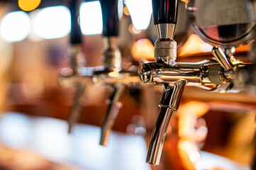 many beer taps in bar or pub